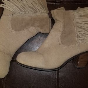 Suede-like fringe booties in doe.